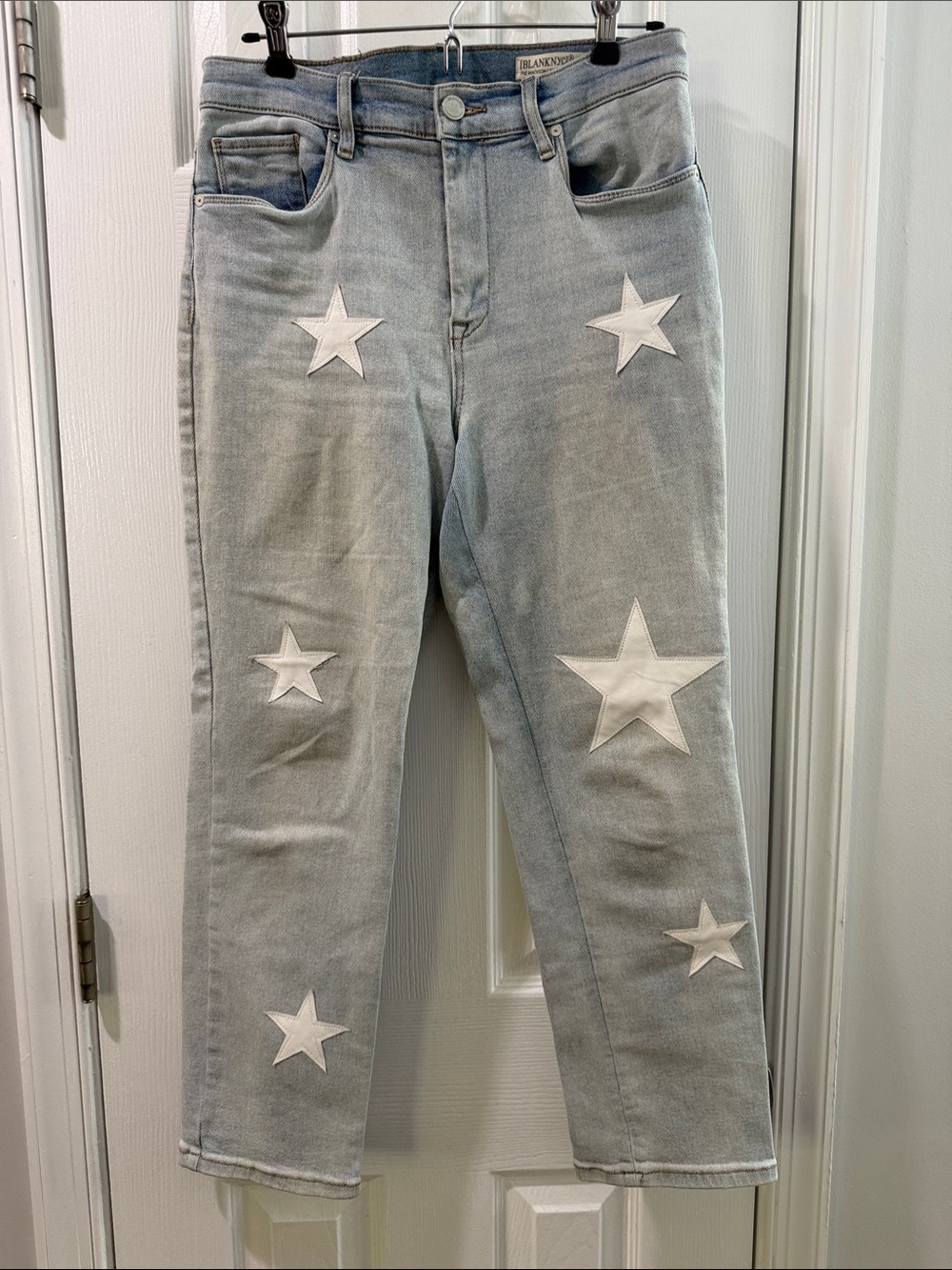 Blank NYC Light Blue Denim Straight Leg Jeans with White Star Appliqués